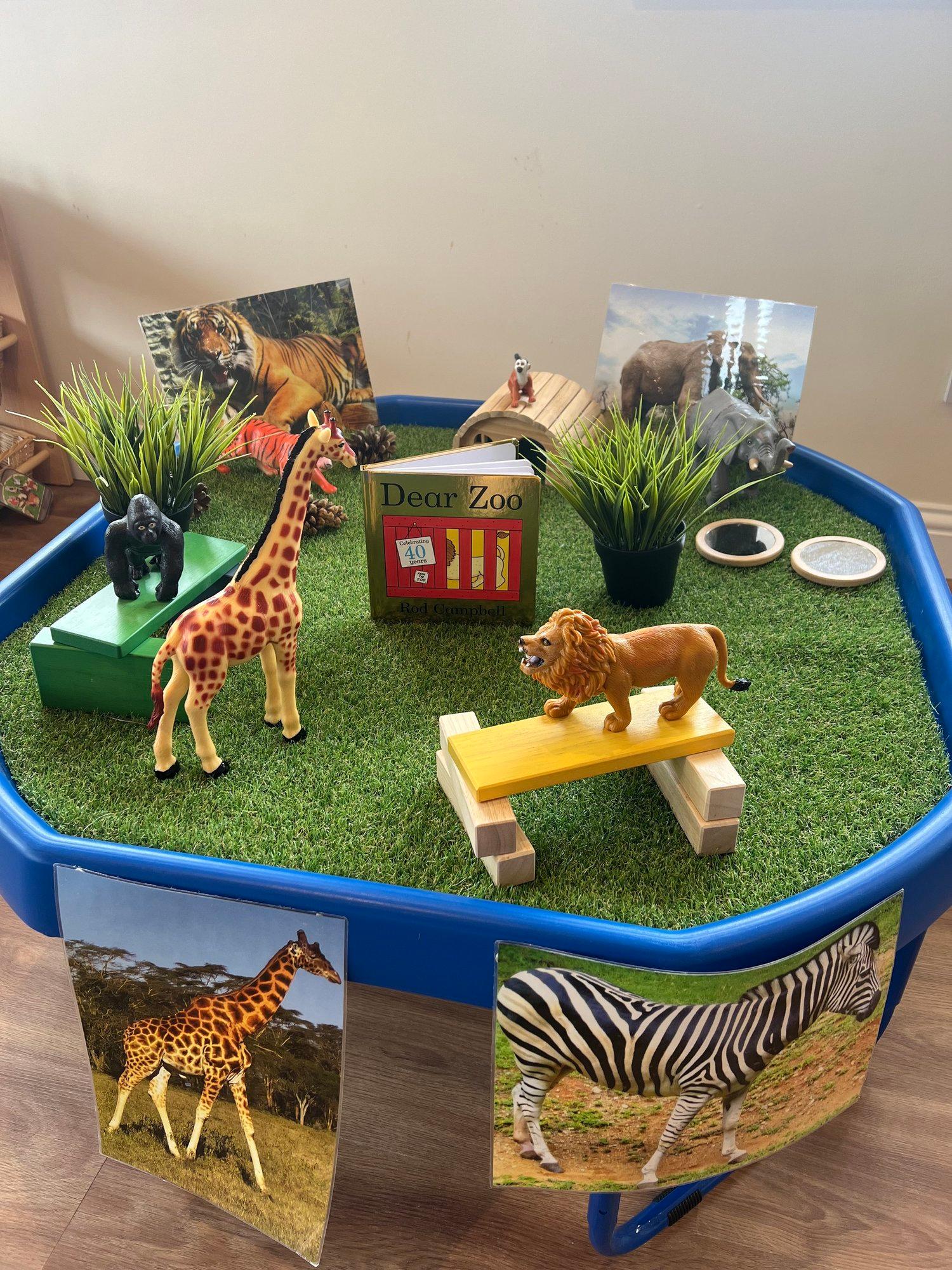 A story-led activity with animal models and the book Dear Zoo